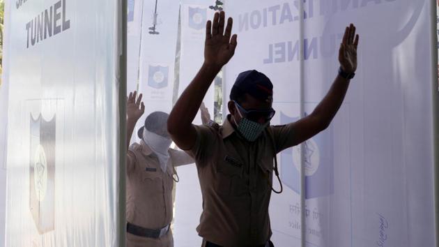 Full-body misting sanitisation enclosures outside Bibvewadi police station in Pune. (Rahul Raut/HT PHOTO) Full-body misting sanitisation enclosures outside Bibvewadi police station in Pune. (Rahul Raut/HT PHOTO)
