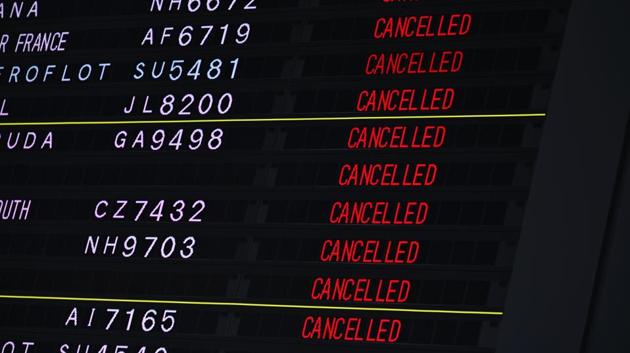 A signboard shows cancelled flights at the departures area of the international terminal at Narita International Airport in Chiba Prefecture on April 7. (Charly Triballeau / AFP) A signboard shows cancelled flights at the departures area of the international terminal at Narita International Airport in Chiba Prefecture on April 7. (Charly Triballeau / AFP)