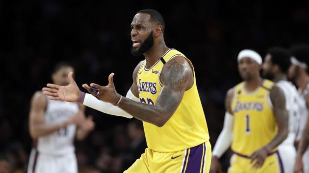 Los Angeles Lakers' LeBron James argues a call during the second half of an NBA basketball game against the Brooklyn Nets Tuesday. (AP) Los Angeles Lakers' LeBron James argues a call during the second half of an NBA basketball game against the Brooklyn Nets Tuesday. (AP)