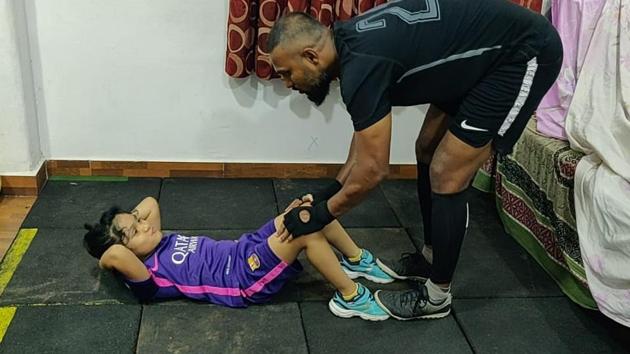 Working out has become a very nice bonding activity during the lockdown because Savio’s five-year-old daughter joins him every day for the workout. (HT PHOTO) Working out has become a very nice bonding activity during the lockdown because Savio’s five-year-old daughter joins him every day for the workout. (HT PHOTO)