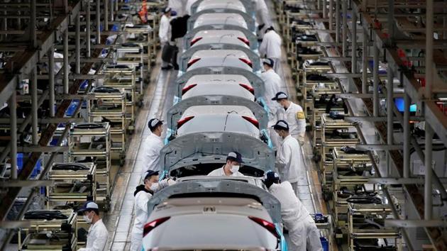 Employees work on a production line inside a Dongfeng Honda factory after lockdown measures in Wuhan, the capital of Hubei province and China’s epicentre of the novel coronavirus disease (COVID-19) outbreak, were further eased. (REUTERS) Employees work on a production line inside a Dongfeng Honda factory after lockdown measures in Wuhan, the capital of Hubei province and China’s epicentre of the novel coronavirus disease (COVID-19) outbreak, were further eased. (REUTERS)
