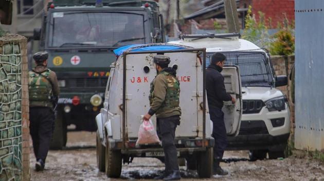 Security forces cordon off an area during an encounter with militants at Sopore, in Baramulla district of South Kashmir on Wednesday. (PTI) Security forces cordon off an area during an encounter with militants at Sopore, in Baramulla district of South Kashmir on Wednesday. (PTI)
