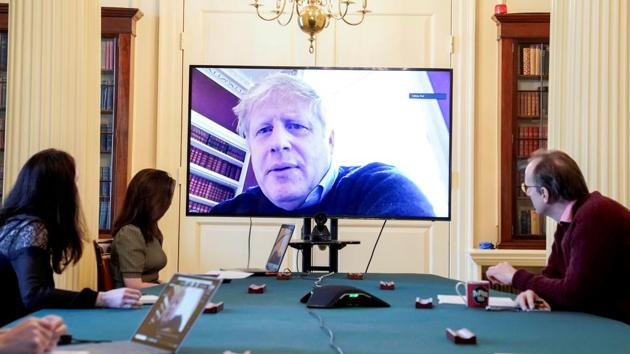Britain's Prime Minister Boris Johnson appears on a monitor for the coronavirus disease meeting in London, Britain on March 28, 2020.(Reuters Photo) Britain's Prime Minister Boris Johnson appears on a monitor for the coronavirus disease meeting in London, Britain on March 28, 2020.(Reuters Photo)