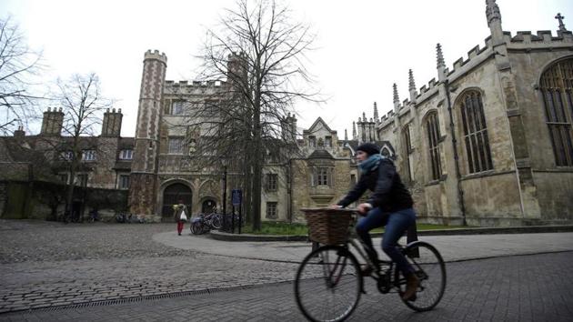 A cyclist rides a bicycle past Trinity College, part of the University of Cambridge, in Cambridge, U.K (Bloomberg) A cyclist rides a bicycle past Trinity College, part of the University of Cambridge, in Cambridge, U.K (Bloomberg)