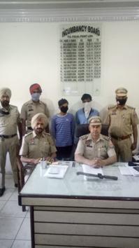 The thieves were brought to the Focal Point police station in Ludhiana on April 5 for clicking a picture to be released with the press note. It was here that Saurav Sehgal, the thief (in black mask) and his accomplice Navjot Singh (wearing white handkerchief) came in contact with station house officer inspector Mohammad Jamil (seated, right). (HT file photo) The thieves were brought to the Focal Point police station in Ludhiana on April 5 for clicking a picture to be released with the press note. It was here that Saurav Sehgal, the thief (in black mask) and his accomplice Navjot Singh (wearing white handkerchief) came in contact with station house officer inspector Mohammad Jamil (seated, right). (HT file photo)