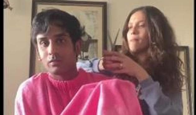 Ankita Lokhande cuts her brother’s hair.