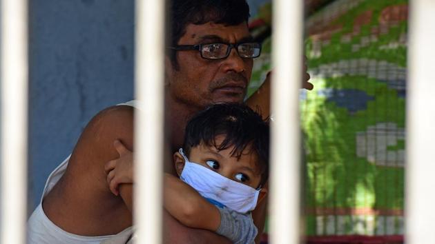 A kid seen wearing mask at Antop hill during nationwide lockdown imposed to prevent the spread of coronavirus pandemic in Mumbai. (Vijayanand Gupta/HT Photo) A kid seen wearing mask at Antop hill during nationwide lockdown imposed to prevent the spread of coronavirus pandemic in Mumbai. (Vijayanand Gupta/HT Photo)