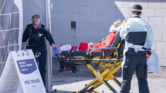 A patient is wheeled into the emergency unit of the Verdun Hospital in Montreal, Canada, April 6, 2020. According to a US intelligence report, places where there are still larger gatherings like hospitals, pharmacies and supermarkets could be “potentially attractive targets” for terrorists. (AP) A patient is wheeled into the emergency unit of the Verdun Hospital in Montreal, Canada, April 6, 2020. According to a US intelligence report, places where there are still larger gatherings like hospitals, pharmacies and supermarkets could be “potentially attractive targets” for terrorists. (AP)