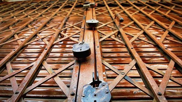 Covid-19 in India: Locks on a grill in front of a shuttered jewellery store in the walled city area that has the curfew bound Ramganj area hotspot, on day sixteen of the 21 day lockdown to limit coronavirus, in Jaipur.(Photo: Himanshu Vyas / Hindustan Times)