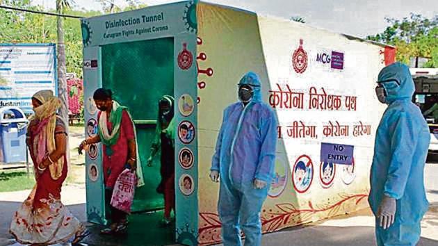 Visitors at the Civil Hospital in Sector 10 are put through a disinfection tunnel at the entrance. (Yogendra Kumar/HT PHOTO) Visitors at the Civil Hospital in Sector 10 are put through a disinfection tunnel at the entrance. (Yogendra Kumar/HT PHOTO)
