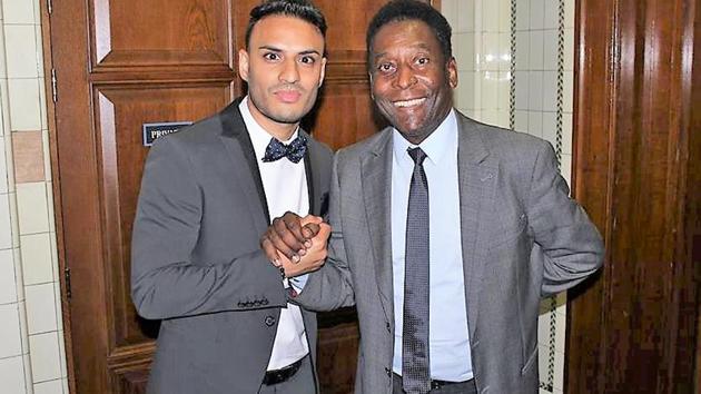 Kashif Siddiqi with Pele who is a charity ambassador for Football For Peace, founded by Siddiqi and Fifa Legend Elias Figueroa in 2013.(HT Photo)