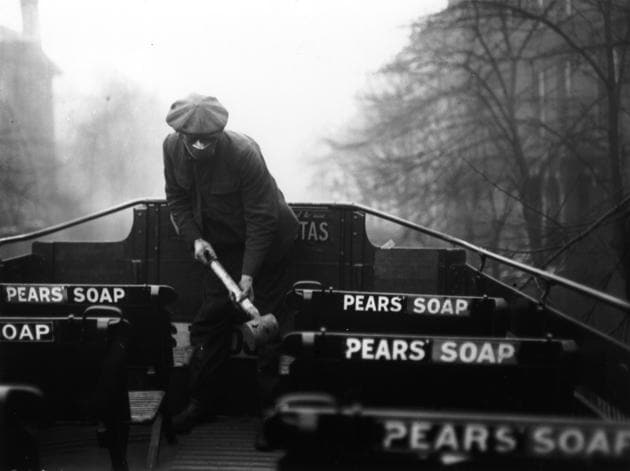 A man spraying the top of a bus with an anti-flu virus during an epidemic which followed World War 1.(Davis/Getty Images)