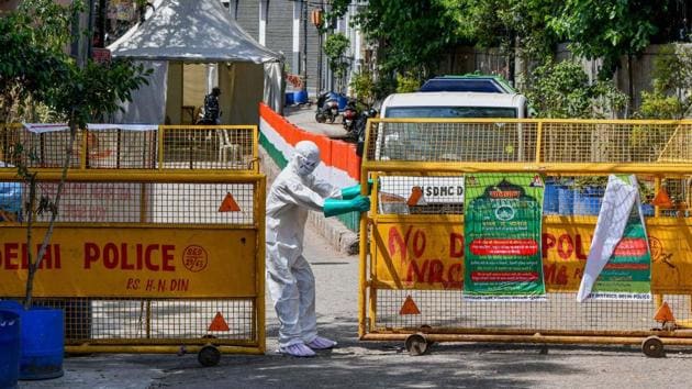 A health worker during a sanitisation drive near Nizamuddin mosque, identified as a COVID-19 hotspot, amid the nationwide lockdown to curb the spread of coronavirus in New Delhi on April 10, 2020.(PTI)