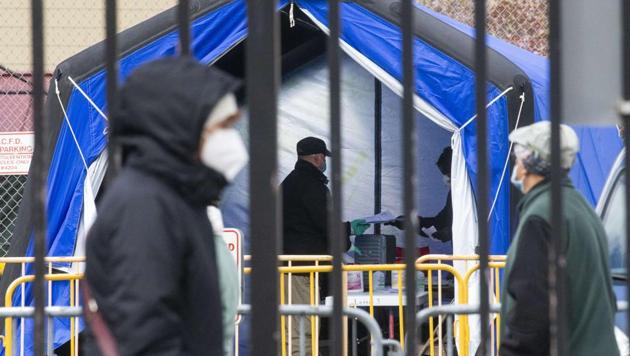 A person arrives at a coronavirus walk-up testing site at Public Safety Headquarters on April 10, 2020 in Jersey City. (AFP photo) A person arrives at a coronavirus walk-up testing site at Public Safety Headquarters on April 10, 2020 in Jersey City. (AFP photo)