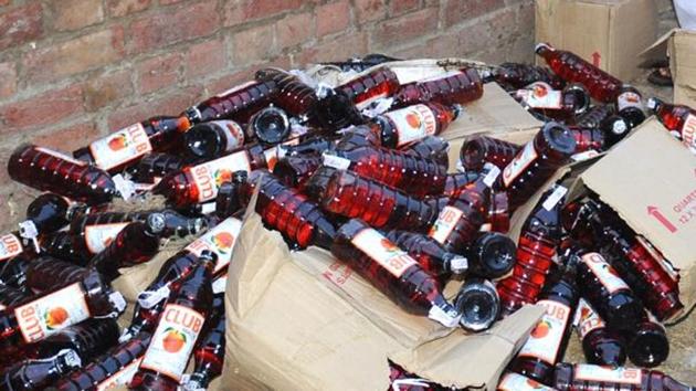 Liquor bottles were seized by West Bengal Excise Dept. in Malda district.(Bharat Bhushan/Hindustan Times)