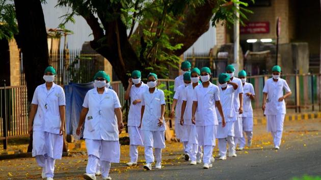 Nurses from KEM Hospital on their way to duty during restrictions on citizen's movement on account of section 144 due to COVID 19 pandemic in Mumbai, India, on Thursday, April 9, 2020. (Vijayanand Gupta/HT Photo) Nurses from KEM Hospital on their way to duty during restrictions on citizen's movement on account of section 144 due to COVID 19 pandemic in Mumbai, India, on Thursday, April 9, 2020. (Vijayanand Gupta/HT Photo)
