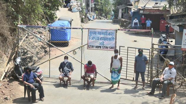 Villagers in Thane stand guard to restrict the entry of outsiders following the nationwide lockdown amid coronavirus outbreak, (PTI Photo) Villagers in Thane stand guard to restrict the entry of outsiders following the nationwide lockdown amid coronavirus outbreak, (PTI Photo)