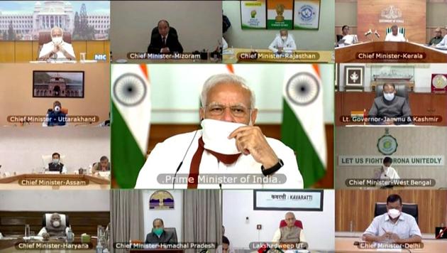Prime Minister Narendra Modi seen wearing a mask during video-conferencing with the Chief Ministers over Covid-19, in New Delhi on Saturday. (ANI Photo) Prime Minister Narendra Modi seen wearing a mask during video-conferencing with the Chief Ministers over Covid-19, in New Delhi on Saturday. (ANI Photo)