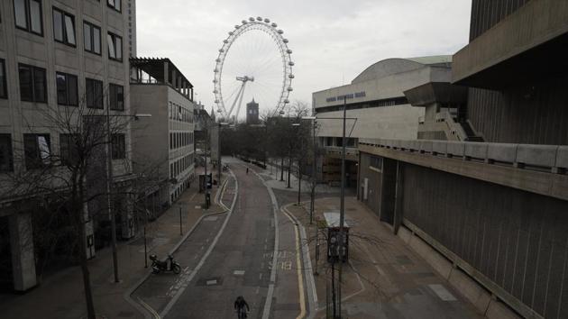 Big Ben's clock tower and the London Eye ferris wheel stand in the distance as the area around Royal Festival Hall is nearly-deserted in London, Wednesday, April 8, 2020. (AP) Big Ben's clock tower and the London Eye ferris wheel stand in the distance as the area around Royal Festival Hall is nearly-deserted in London, Wednesday, April 8, 2020. (AP)