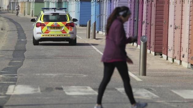 Police officers patrol the sea front area at Bournemouth beach, as the UK continues in lockdown to help curb the spread of the coronavirus, in Bournemouth, England, Friday April 10, 2020. (AP photo) Police officers patrol the sea front area at Bournemouth beach, as the UK continues in lockdown to help curb the spread of the coronavirus, in Bournemouth, England, Friday April 10, 2020. (AP photo)