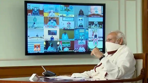 Prime Minister Narendra Modi seen wearing a mask during video-conferencing with the chief ministers in New Delhi on Saturday, April 11, 2020. (ANI) Prime Minister Narendra Modi seen wearing a mask during video-conferencing with the chief ministers in New Delhi on Saturday, April 11, 2020. (ANI)
