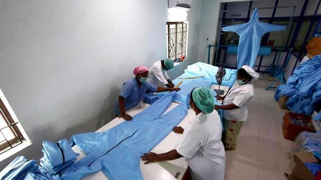 A manufacturing company’s workers preparing preventive cover-up suits for the medics amid coronavirus pandemic, in Chennai. (ANI Photo) A manufacturing company’s workers preparing preventive cover-up suits for the medics amid coronavirus pandemic, in Chennai. (ANI Photo)