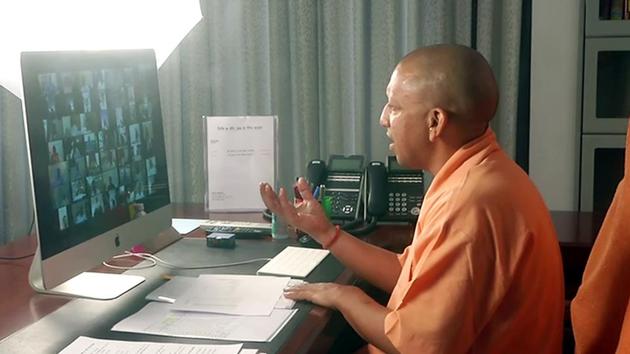 Uttar Pradesh CM Yogi Adityanath interacts with district officials on Covid-19 arrangements through video conferencing in Lucknow . (ANI Photo) Uttar Pradesh CM Yogi Adityanath interacts with district officials on Covid-19 arrangements through video conferencing in Lucknow . (ANI Photo)