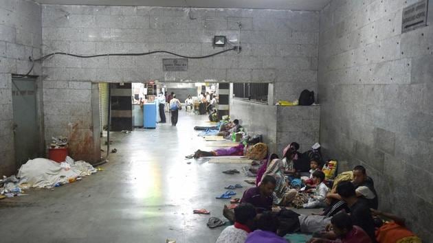 People including discharged patients and their attendants, who were admitted to All India Institute of Medical Science (AIIMS), take refuge amidst unhygienic conditions at a subway near the hospital during the nationwide lockdown imposed to contain the coronavirus pandemic, in New Delhi. (PTI) People including discharged patients and their attendants, who were admitted to All India Institute of Medical Science (AIIMS), take refuge amidst unhygienic conditions at a subway near the hospital during the nationwide lockdown imposed to contain the coronavirus pandemic, in New Delhi. (PTI)