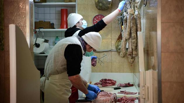 Because of the Easter weekend, the village butcher, Olimpio, has also prepared trays of lamb with Palagano’s young people doing the deliveries. (Piero Cruciatti / AFP) Because of the Easter weekend, the village butcher, Olimpio, has also prepared trays of lamb with Palagano’s young people doing the deliveries. (Piero Cruciatti / AFP)