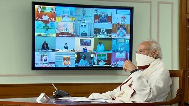 Prime Minister Narendra Modi seen wearing a mask during video-conferencing with the chief ministers over Covid-19, in New Delhi on Saturday.(ANI Photo)