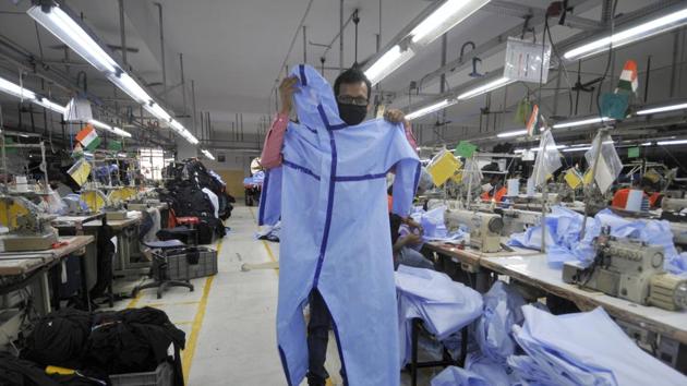 Workers stitch personal protective equipment (PPE) suits at a manufacturing unit in GB Nagar.(Sunil Ghosh / Hindustan Times/Representative Image) Workers stitch personal protective equipment (PPE) suits at a manufacturing unit in GB Nagar.(Sunil Ghosh / Hindustan Times/Representative Image)