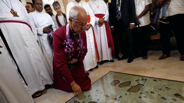 Justin Welby, Archbishop of Canterbury, prays for victims of the 2019 Easter Sunday bomb attack, kneeling at the spot where the suicide bomber detonated explosives, during his visit at St. Sebastian's Church, Katuwapitiya village in Negombo, Sri Lanka August 29, 2019.(Reuters/ Image for representation) Justin Welby, Archbishop of Canterbury, prays for victims of the 2019 Easter Sunday bomb attack, kneeling at the spot where the suicide bomber detonated explosives, during his visit at St. Sebastian's Church, Katuwapitiya village in Negombo, Sri Lanka August 29, 2019.(Reuters/ Image for representation)
