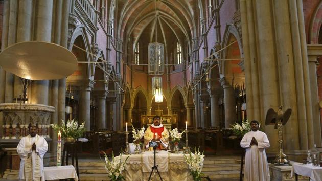 Rev. Shahid Mehraj, center, leads an Easter Mass live-streamed from Cathedral Church of the Resurrection due to a government-imposed lockdown in Lahore, Pakistan. Francis’ lonely mass was a scene that was repeated around the world, with churches either closed or, for the few still open, forcing the faithful to practice social distancing. (K.M. Chaudary / AP)