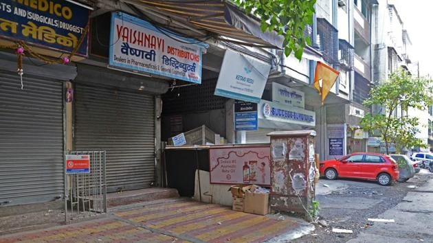 Medical shops located at Sadashiv peth were seen shut on Sunday. Shops are shut at 2pm as they are in the containment zone. (HT/PHOTO) Medical shops located at Sadashiv peth were seen shut on Sunday. Shops are shut at 2pm as they are in the containment zone. (HT/PHOTO)