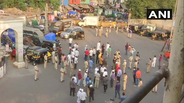 In viral videos, police were seen resorting to mild cane-charge to disperse the migrants, who had gathered at the bus depot near the Bandra railway station in suburban Mumbai. (ANI) In viral videos, police were seen resorting to mild cane-charge to disperse the migrants, who had gathered at the bus depot near the Bandra railway station in suburban Mumbai. (ANI)