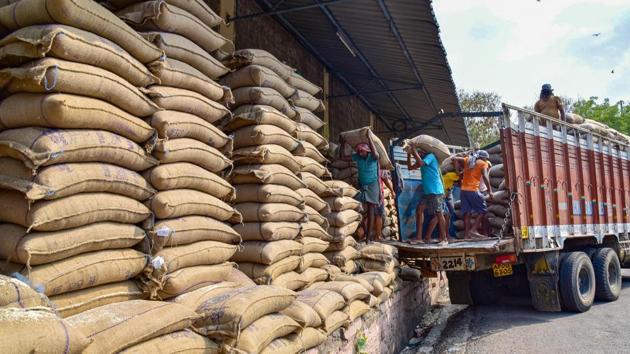 Labourers load rice sacks on a truck at Food Corporation of India for distribution in the city in Hyderabad, on April 13. A majority of India’s states have backed an extension of the lockdown but some have sought an easing of the lockdown in areas outside the Covid-19 hot spots and containment zones to help get the wheels of the economy turning. (PTI)