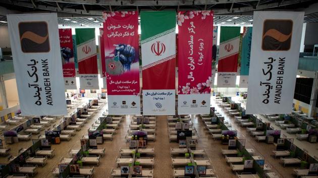 Beds for Covid-19 patients fill the floor in a temporary coronavirus hospital setup at the Iran Mall in Tehran. This shopping centre is also one of the world’s largest commercial and recreational complexes. (Ali Mohammadi / Bloomberg) Beds for Covid-19 patients fill the floor in a temporary coronavirus hospital setup at the Iran Mall in Tehran. This shopping centre is also one of the world’s largest commercial and recreational complexes. (Ali Mohammadi / Bloomberg)
