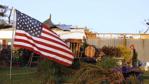 Images showed lines of smashed, roofless houses where tornadoes had blasted through, many homes just piles of rubble sitting atop foundations. (AP Photo) Images showed lines of smashed, roofless houses where tornadoes had blasted through, many homes just piles of rubble sitting atop foundations. (AP Photo)