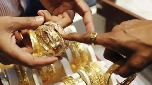 Gold prices in India touched a record high as they crossed 46,700 level per 10 gram.(Reuters Photo)