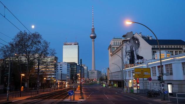 The Fernsehturm Tower stands near an empty road a tramlines at dawn in Berlin, Germany, on Sunday, April 12, 2020. (Krisztian Bocsi / Bloomberg) The Fernsehturm Tower stands near an empty road a tramlines at dawn in Berlin, Germany, on Sunday, April 12, 2020. (Krisztian Bocsi / Bloomberg)
