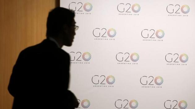 A man stands next to a board with the G20 Meeting of Finance Ministers logo. (REUTERS) A man stands next to a board with the G20 Meeting of Finance Ministers logo. (REUTERS)