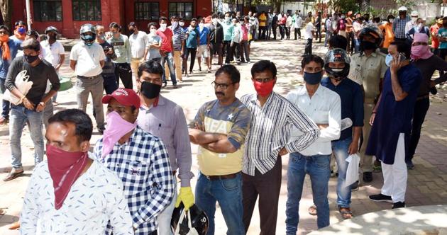 A long queue of people seen to purchase mask and sanitizer during the first day of national lockdown imposed to curb the spread of coronavirus, at district collectorate, in Ranchi, Jharkhand, India, on March 25, 2020. (Diwakar Prasad/ Hindustan Times) A long queue of people seen to purchase mask and sanitizer during the first day of national lockdown imposed to curb the spread of coronavirus, at district collectorate, in Ranchi, Jharkhand, India, on March 25, 2020. (Diwakar Prasad/ Hindustan Times)
