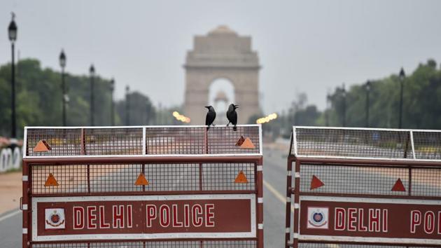 Police barricades seen at Rajpath during the lockdown in New Delhi, India, on Tuesday, April 14, 2020. India Gate is also seen in the background. (Ajay Aggarwal/HT PHOTO) Police barricades seen at Rajpath during the lockdown in New Delhi, India, on Tuesday, April 14, 2020. India Gate is also seen in the background. (Ajay Aggarwal/HT PHOTO)