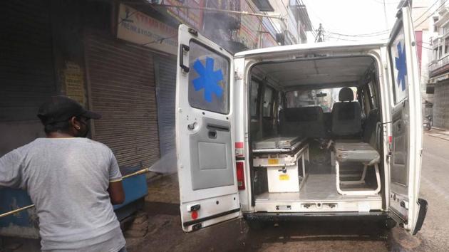 An ambulance is chemically sanitized after a coronavirus infected patient was carried in it during the lockdown, at Nazirabad, in Lucknow. (Dheeeraj Dhawan/HT PHOTO) An ambulance is chemically sanitized after a coronavirus infected patient was carried in it during the lockdown, at Nazirabad, in Lucknow. (Dheeeraj Dhawan/HT PHOTO)