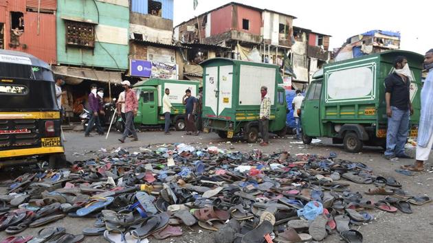 Shoes of migrant workers are seen scattered on a road after they were chased away by the police. State tourism minister and senior leader of the ruling party Shiv Sena, Aaditya Thackeray, sought a road map to facilitate their journey back to their native places. “They don’t want food or shelter, they want to go back home,” Thackeray said, adding that the feedback from all migrant labour camps is similar — “that these workers want to go back”. (AP)