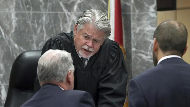 The image shows Broward Circuit Judge Dennis Bailey, who wrote the plea, speaking to a defense attorney (representational image). (AP) The image shows Broward Circuit Judge Dennis Bailey, who wrote the plea, speaking to a defense attorney (representational image). (AP)