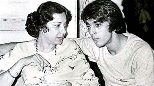 Sanjay Dutt with his mother Nargis at an event.