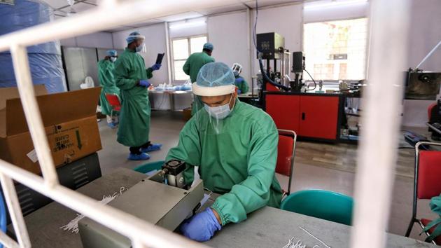 CRPF personnel making Personal Protection Equipment (PPE) kits at a CRPF camp during countrywide lockdown amid Coronavirous Pandemic, in New Delhi on Friday. (ANI file photo) CRPF personnel making Personal Protection Equipment (PPE) kits at a CRPF camp during countrywide lockdown amid Coronavirous Pandemic, in New Delhi on Friday. (ANI file photo)