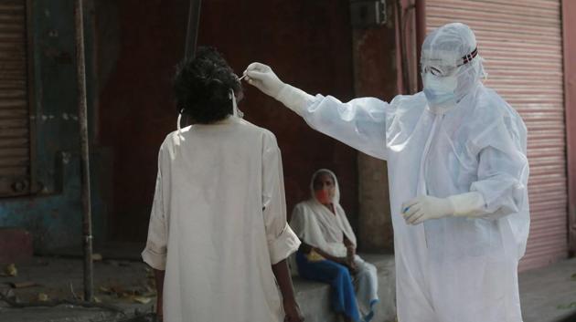 Medical workers conduct coronavirus tests for residents of Jaipur during the lockdown, Rajasthan, India, on Wednesday, April 15 2020. (Photo by Himanshu Vyas / Hindustan Times) Medical workers conduct coronavirus tests for residents of Jaipur during the lockdown, Rajasthan, India, on Wednesday, April 15 2020. (Photo by Himanshu Vyas / Hindustan Times)