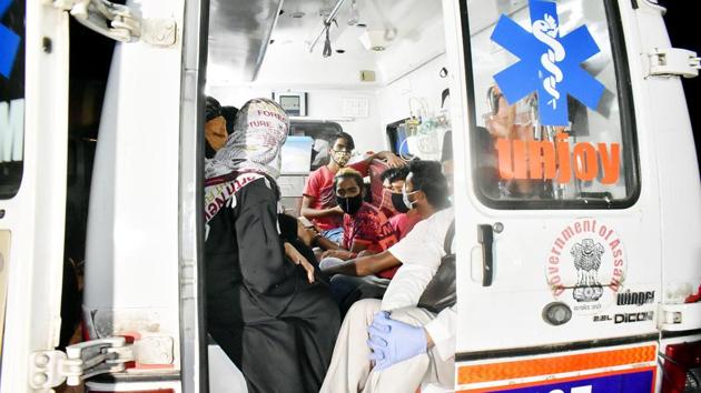 An ambulance taking people from the Jamaat-e-Islami Hind Office to a quarantine center in Guwahati on Thursday. (ANI) An ambulance taking people from the Jamaat-e-Islami Hind Office to a quarantine center in Guwahati on Thursday. (ANI)